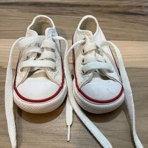 Baby white converse sneakers